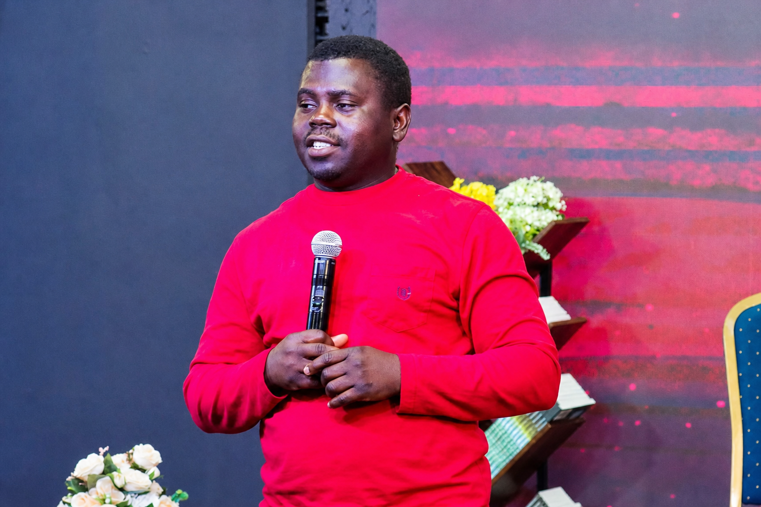 Moses Oluwanifise speaking at an event